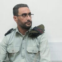 Dan Sharoni, an IDF officer accused of sexual offenses, during a court hearing at a military court in Beit Lid, July 24, 2022. (Gideon Markowicz/Flash90)