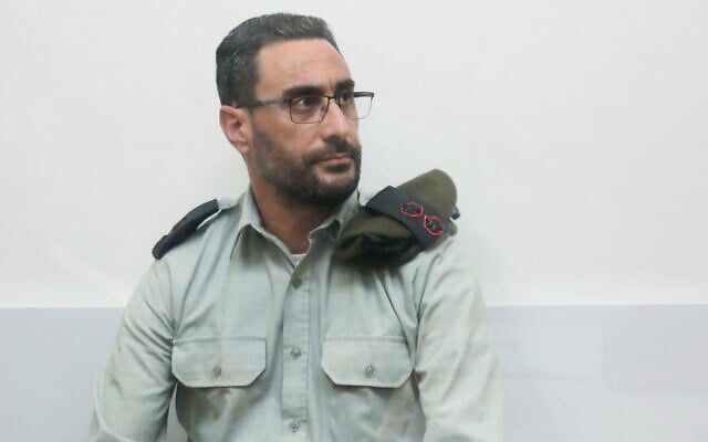 Dan Sharoni, an IDF officer accused of sexual offenses, during a court hearing at a military court in Beit Lid, July 24, 2022. (Gideon Markowicz/Flash90) Dan Sharoni, an IDF officer accused of sexual offenses, during a court hearing at a military court in Beit Lid, July 24, 2022. (Gideon Markowicz/Flash90)