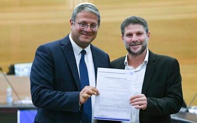 Otzma Yehudit head Itamar Ben Gvir (left) and Religious Zionism leader Bezalel Smotrich submit their joint electoral list to the Central Election Committee at the Knesset on September 14, 2022. (Arie Leib Abrams/Flash90) Otzma Yehudit head Itamar Ben Gvir (left) and Religious Zionism leader Bezalel Smotrich submit their joint electoral list to the Central Election Committee at the Knesset on September 14, 2022. (Arie Leib Abrams/Flash90)