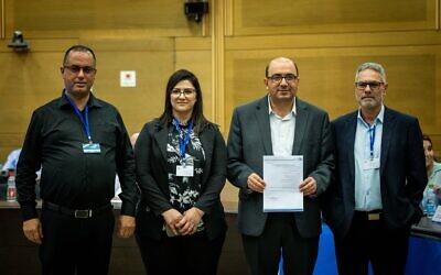 Members of the Balad party register their list for the upcoming elections at the Knesset on September 15, 2022. Party leader Sami Abou Shahadeh is at second from right. (Yonatan Sindel/Flash90)