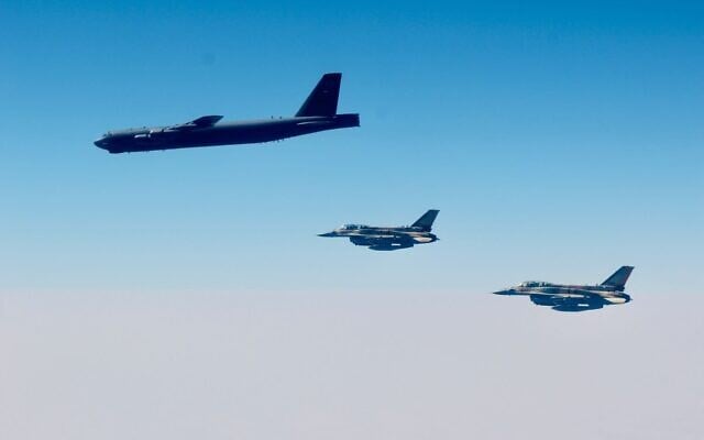 Israeli F-15 fighter jets escort an American B-52 bomber through Israeli airspace en route to the Persian Gulf on September 4, 2022. (Israel Defense Forces) Israeli F-15 fighter jets escort an American B-52 bomber through Israeli airspace en route to the Persian Gulf on September 4, 2022. (Israel Defense Forces)