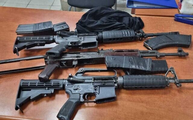 Assault rifles seized by police officers following a shooting in Nazareth, September 29, 2022. (Israel Police) Assault rifles seized by police officers following a shooting in Nazareth, September 29, 2022. (Israel Police)