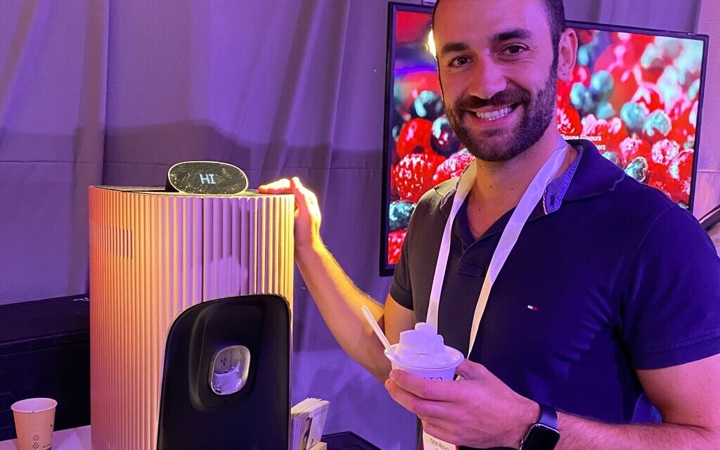 Food technologist Yaron Renasia displays the Solato ice cream machine at the PLANETech World 2022 in Tel Aviv, September 21, 2022. (Shoshanna Solomon) Food technologist Yaron Renasia displays the Solato ice cream machine at the PLANETech World 2022 in Tel Aviv, September 21, 2022. (Shoshanna Solomon)