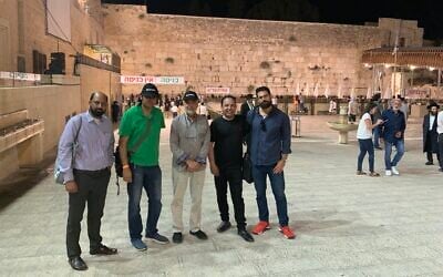 A Pakistani peace delegation visit the Western wall in Jerusalem's Old City, September 21, 2022. (Ash Obel/The Times of Israel)