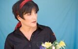 Actress Naomi Ackerman who will perform her one-woman show about domestic abuse, 'Flowers Aren't Enough,' at Jerusalem's Kol Haneshama synagogue on September 29, 2022. (Courtesy: Naomi Ackerman)