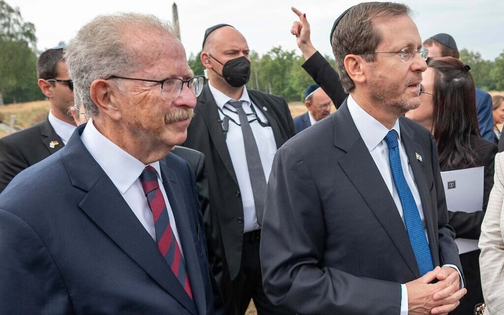 Menachem Rosensaft, left, accompanies Israeli President Isaac Herzog, right, on a visit to the Bergen Belsen concentration camp, September 6, 2022. (Shahar Azran/WJC via JTA) Menachem Rosensaft, left, accompanies Israeli President Isaac Herzog, right, on a visit to the Bergen Belsen concentration camp, September 6, 2022. (Shahar Azran/WJC via JTA)