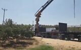 A truck with an aerial boom is seen near a field near Moshav Herut in central Israel after two workers were fatally electrocuted, September 16, 2022. (Twitter screenshot, used in accordance with Clause 27a of the Copyright Law)