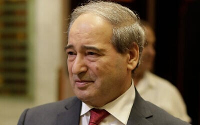 Then Syrian Deputy Foreign Minister Faisal Mekdad speaks to reporters in Damascus, Syria, July 24, 2019. (AP Photo/Hassan Ammar, File)