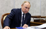 Russian President Vladimir Putin during a meeting in Veliky Novgorod, Russia, September 21, 2022. (Gavriil Grigorov, Sputnik, Kremlin Pool Photo via AP)