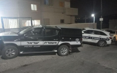 Police cars seen at the scene of a stabbing incident in northern Israel that saw a patrol police officer moderately injured, September 7, 2022. (Israel Police)