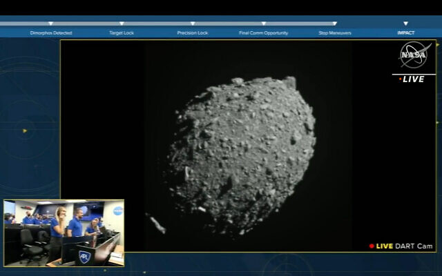 A NASA spacecraft beams images of an asteroid to crew on the ground, before striking the asteroid 7 million miles from Earth, September 26, 2022. (Screenshot) A NASA spacecraft beams images of an asteroid to crew on the ground, before striking the asteroid 7 million miles from Earth, September 26, 2022. (Screenshot)