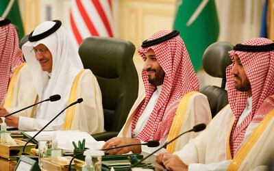 Saudi Crown Prince Mohammed bin Salman, center, participates in a working session with US President Joe Biden at the Al Salman Royal Palace, July 15, 2022, in Jeddah, Saudi Arabia. (AP Photo/Evan Vucci)