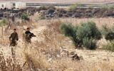 Israeli troops arrest a Palestinian man who allegedly attempted to snatch a soldier's gun near Beit Furik in the northern West Bank, September 7, 2022. (Social media)