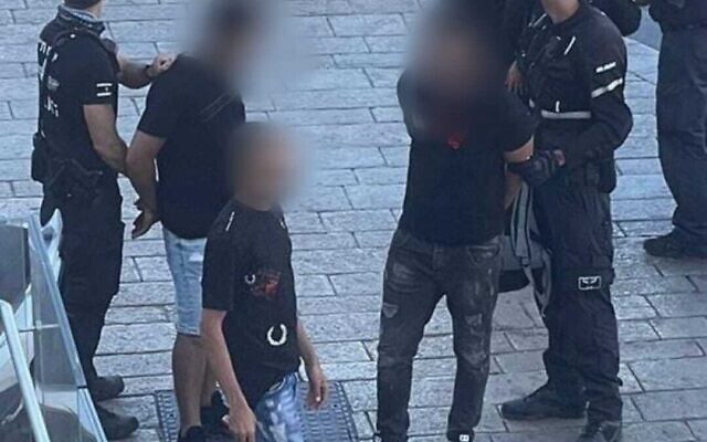 Police arrest an armed Palestinian man in Jaffa on September 8, 2022. (Israel Police)