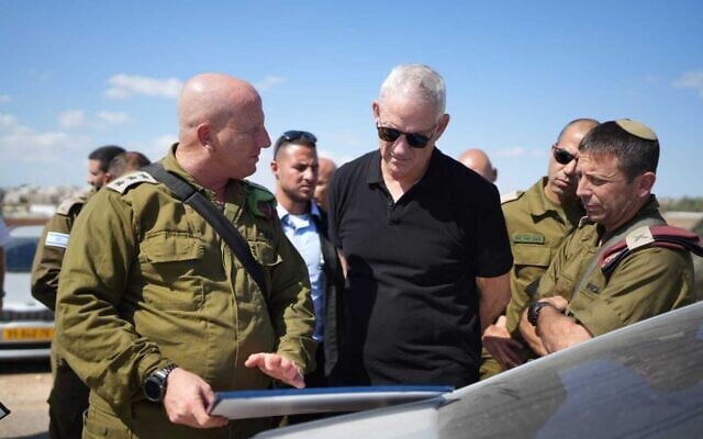 Defense Minister Benny Gantz tours the scene of a deadly gun battle near the Palestinian village of Jalamah in the northern West Bank, September 14, 2022. (Elad Malka/Defense Ministry) Defense Minister Benny Gantz tours the scene of a deadly gun battle near the Palestinian village of Jalamah in the northern West Bank, September 14, 2022. (Elad Malka/Defense Ministry)