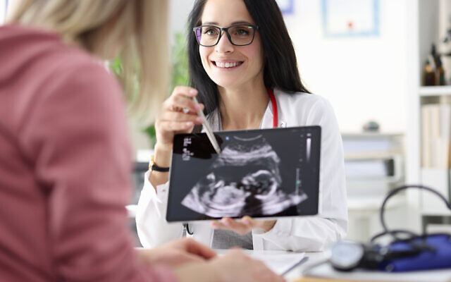 Illustrative image: a gynecologist showing a patient an ultrasound of her fetus. (megaflopp via iStock by Getty Images) Illustrative image: a gynecologist showing a patient an ultrasound of her fetus. (megaflopp via iStock by Getty Images)