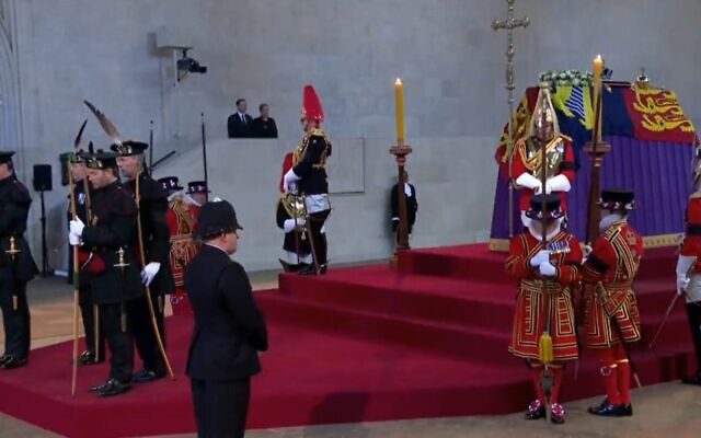 President Isaac Herzog and his wife Michal (background) pass by Queen Elizabeth II lying in state in London on September 18, 2022. (Screenshot) President Isaac Herzog and his wife Michal (background) pass by Queen Elizabeth II lying in state in London on September 18, 2022. (Screenshot)