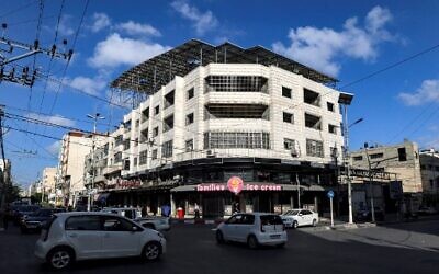 Solar panels placed above a bakery, in Gaza City, September 6, 2022. (MOHAMMED ABED/AFP)