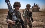 Illustrative: In this file photo taken on September 7, 2022 US soldiers walk during a joint military exercise between forces of the US-led "Combined Joint Task Force-Operation Inherent Resolve" coalition against the Islamic State (IS) group and members of the Syrian Democratic Forces (SDF) in the countryside of the Syrian town of al-Malikiya. (Delil SOULEIMAN / AFP)