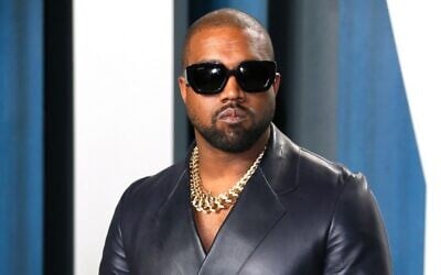 Kanye West attends the Vanity Fair Oscar Party following the 92nd annual Oscars at the Wallis Annenberg Center for the Performing Arts in Beverly Hills, California, February 9, 2020. (Jean-Baptiste Lacroix/AFP)