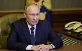 Russian President Vladimir Putin chairs a Security Council meeting via a video link in Saint Petersburg on October 10, 2022. (Gavriil Grigorov/Sputnik/AFP)