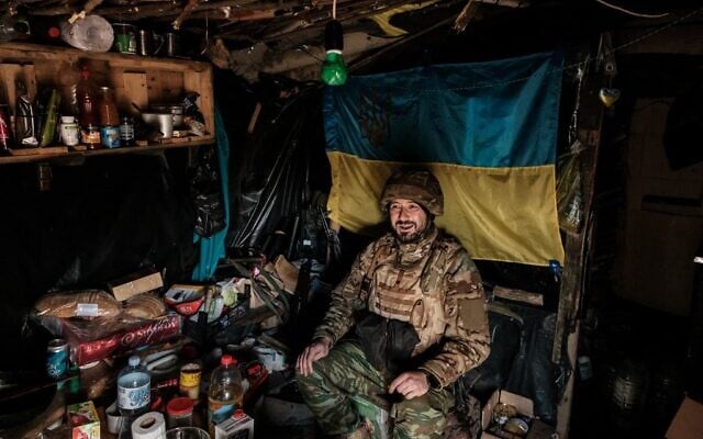 A soldier of Ukraine's 5th Regiment of Assault Infantry sits in their bunker at a front line near Toretsk in the Donetsk region on October 12, 2022, amid the Russian invasion of Ukraine. (Yasuyoshi Chiba/AFP) A soldier of Ukraine's 5th Regiment of Assault Infantry sits in their bunker at a front line near Toretsk in the Donetsk region on October 12, 2022, amid the Russian invasion of Ukraine. (Yasuyoshi Chiba/AFP)