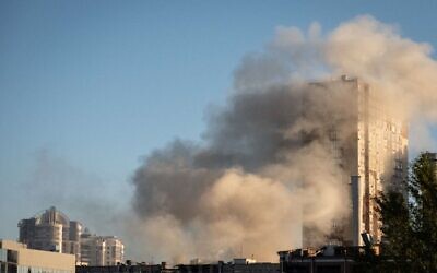 Smoke rises from a building after a drone attack in Kyiv on October 17, 2022, amid the Russian invasion of Ukraine. (Yasuyoshi CHIBA / AFP)