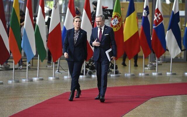 Denmark's Prime Minister Mette Frederiksen (L) and Czech Republic's Prime Minister Petr Fiala arrive for the first day of a EU leaders Summit at The European Council Building in Brussels on October 20, 2022. (John Thys/AFP) Denmark's Prime Minister Mette Frederiksen (L) and Czech Republic's Prime Minister Petr Fiala arrive for the first day of a EU leaders Summit at The European Council Building in Brussels on October 20, 2022. (John Thys/AFP)