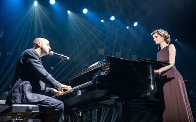 Idan Raichel (left) and Emma Shapplin at the 2019 duet in Tel Aviv; Shapplin returns to Tel Aviv on January 31, 2022 (Courtesy YouTube screen grab) Idan Raichel (left) and Emma Shapplin at the 2019 duet in Tel Aviv; Shapplin returns to Tel Aviv on January 31, 2022 (Courtesy YouTube screen grab)