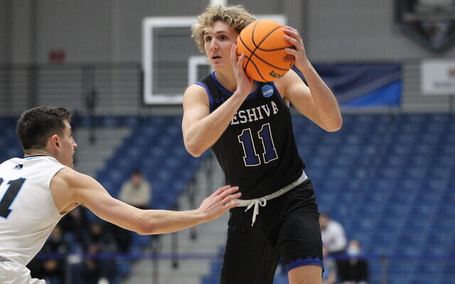 Yeshiva University's Ryan Turell dribbles the ball during a basketball match vs. Johns Hopkins in NCAA Division 3 action at Stockton University, Absecom, New Jersey, March 4, 2022. (Courtesy of Yeshiva University via JTA) Yeshiva University's Ryan Turell dribbles the ball during a basketball match vs. Johns Hopkins in NCAA Division 3 action at Stockton University, Absecom, New Jersey, March 4, 2022. (Courtesy of Yeshiva University via JTA)