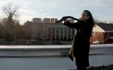 Audrey Glickman, a survivor of the 2018 Tree of Life synagogue shooting in Pittsburgh, blows the shofar outside the building in the new HBO documentary "A Tree of Life." (HBO)