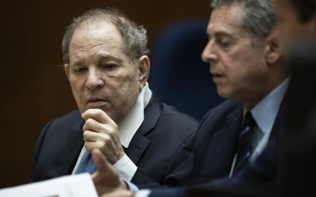 Former film producer Harvey Weinstein, left, interacts with his attorney Mark Werksman in court at the Clara Shortridge Foltz Criminal Justice Center in Los Angeles, California, October 4, 2022. (Etienne Laurent/Pool Photo via AP) Former film producer Harvey Weinstein, left, interacts with his attorney Mark Werksman in court at the Clara Shortridge Foltz Criminal Justice Center in Los Angeles, California, October 4, 2022. (Etienne Laurent/Pool Photo via AP)