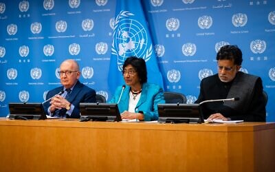 UN commissioners Chris Sidoti, left, Navi Pillay, center, and Miloon Kothari, right, discuss their probe into Israel and the Palestinians at the United Nations in New York, October 27, 2022. (Luke Tress/Times of Israel)