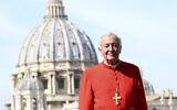 Archbishop of Westminster and President of the Catholic Bishops' Conference of England and Wales Vincent Gerard Nichols poses in front the St. Peter's Basilica during a reception for the Cardinal Newman Canonization at Pontifical Urban College, Sunday, Oct. 13, 2019, in Vatican City, Vatican. (Franco Origlia/pool photo via AP)
