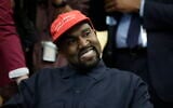 File - Rapper Kanye West wears a Make America Great Again hat during a meeting with then-US president Donald Trump in the Oval Office of the White House in Washington on October 11, 2018. (AP Photo/Evan Vucci, File)