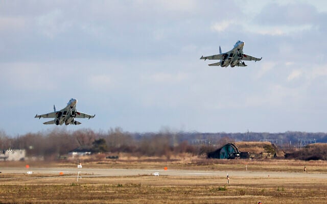 FILE -- Two Russian Su-30 fighter jets take off taking part in a training mission in Krasnodar Region, Russia, Jan. 19, 2022. (AP Photo/Vitaliy Timkiv)