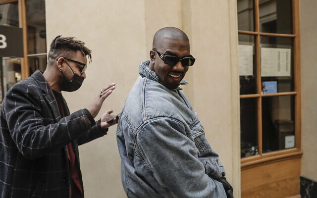 Kanye West attends the Kenzo fall-winter 22/23 men's collection, in Paris, Jan. 23, 2022. (AP/Lewis Joly) Kanye West attends the Kenzo fall-winter 22/23 men's collection, in Paris, Jan. 23, 2022. (AP/Lewis Joly)