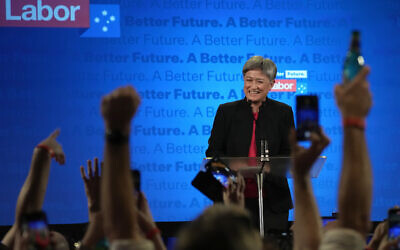 Labor Party senator Penny Wong smiles as she introduces party leader Anthony Albanese at an event in Sydney, Australia, Sunday, May 22, 2022, after Prime Minister Scott Morrison conceding defeat to Albanese in a federal election. (AP/Rick Rycroft)