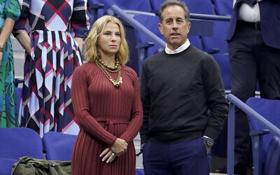 Jessica Seinfeld, left, and Jerry Seinfeld, wait for the start of the men's singles final of the US Open tennis championships, September 11, 2022, in New York.(AP Photo/John Minchillo)