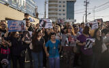 Protesters gather in Sulaimaniyah on September 28, 2022, protest the killing of Mahsa Amini, an Iranian Kurdish woman after she was arrested in Tehran by morality police for wearing her headscarf improperly. (AP Photo/Hawre Khalid, Metrography)