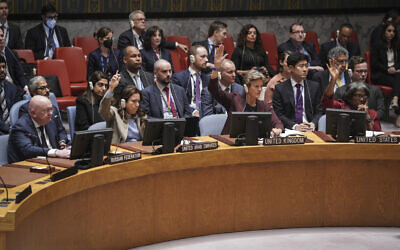 Russian Ambassador to the United Nations Vasily Nebenzya, left, keeps his hand down as some members of the UN Security Council vote on a draft resolution sanctioning Russia's planned annexation of war-occupied Ukraine territory, Friday, September 30, 2022, at UN headquarters. (AP Photo/Bebeto Matthews) Russian Ambassador to the United Nations Vasily Nebenzya, left, keeps his hand down as some members of the UN Security Council vote on a draft resolution sanctioning Russia's planned annexation of war-occupied Ukraine territory, Friday, September 30, 2022, at UN headquarters. (AP Photo/Bebeto Matthews)