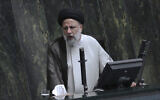 Iranian President Ebrahim Raisi addresses the parliament in a vote of confidence session for his proposed labor minister in Tehran, Iran, October 4, 2022. (AP/Vahid Salemi)