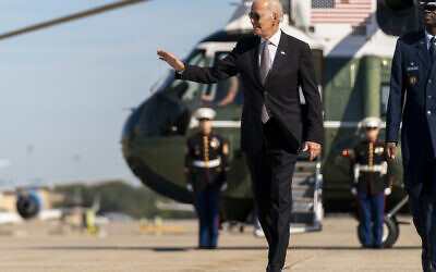 US President Joe Biden boards Air Force One at Andrews Air Force Base, Maryland, on Oct. 6, 2022, to travel to Poughkeepsie, N.Y. (AP Photo/Andrew Harnik)