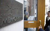People talk near the entrance to human rights group Memorial's office, in Moscow, Russia, on March 21, 2013. (AP Photo/Ivan Sekretarev, File)