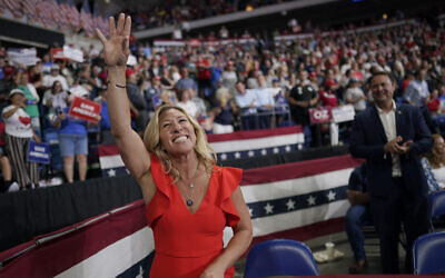 Rep. Marjorie Taylor Greene, R-Ga., waves at supporters before former President Donald Trump speaks at a rally in Wilkes-Barre, Pa., September 3, 2022. (AP Photo/Mary Altaffer, File)