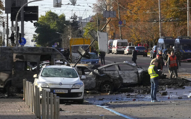 Police inspect the scene of Russian shelling in Kyiv, Ukraine, October 10, 2022. (AP Photo/Efrem Lukatsky)