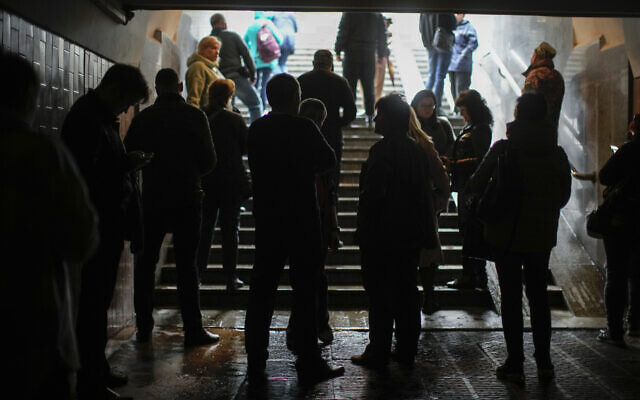 People shelter in a subway station after a Russian strike in Kharkiv, Ukraine, October 10, 2022. (AP Photo/Francisco Seco)