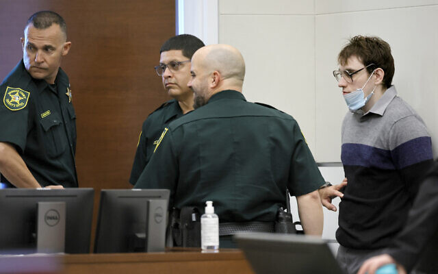 Marjory Stoneman Douglas High School shooter Nikolas Cruz leans against a wall in the courtroom at the Broward County Courthouse in Fort Lauderdale, Florida on October 13, 2022. (Mike Stocker/South Florida Sun Sentinel via AP, Pool) Marjory Stoneman Douglas High School shooter Nikolas Cruz leans against a wall in the courtroom at the Broward County Courthouse in Fort Lauderdale, Florida on October 13, 2022. (Mike Stocker/South Florida Sun Sentinel via AP, Pool)