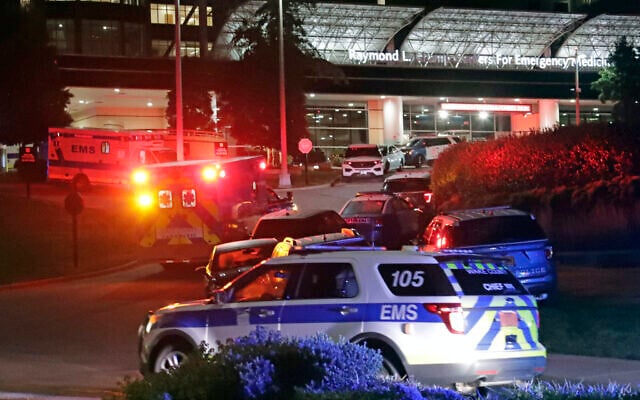 An EMS vehicle believed to be carrying the suspect in a multiple shooting arrives at WakeMed emergency room with a heavy police escort in Raleigh, North Carolina, Oct. 13, 2022. (AP Photo/Chris Seward) An EMS vehicle believed to be carrying the suspect in a multiple shooting arrives at WakeMed emergency room with a heavy police escort in Raleigh, North Carolina, Oct. 13, 2022. (AP Photo/Chris Seward)