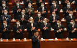Chinese President Xi Jinping arrives for the opening ceremony of the 20th National Congress of China's ruling Communist Party held at the Great Hall of the People in Beijing, China, Sunday, Oct. 16, 2022. (AP/Mark Schiefelbein)